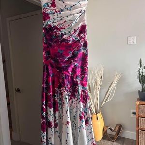 Satin strapless stunning gown . Worn once like new .